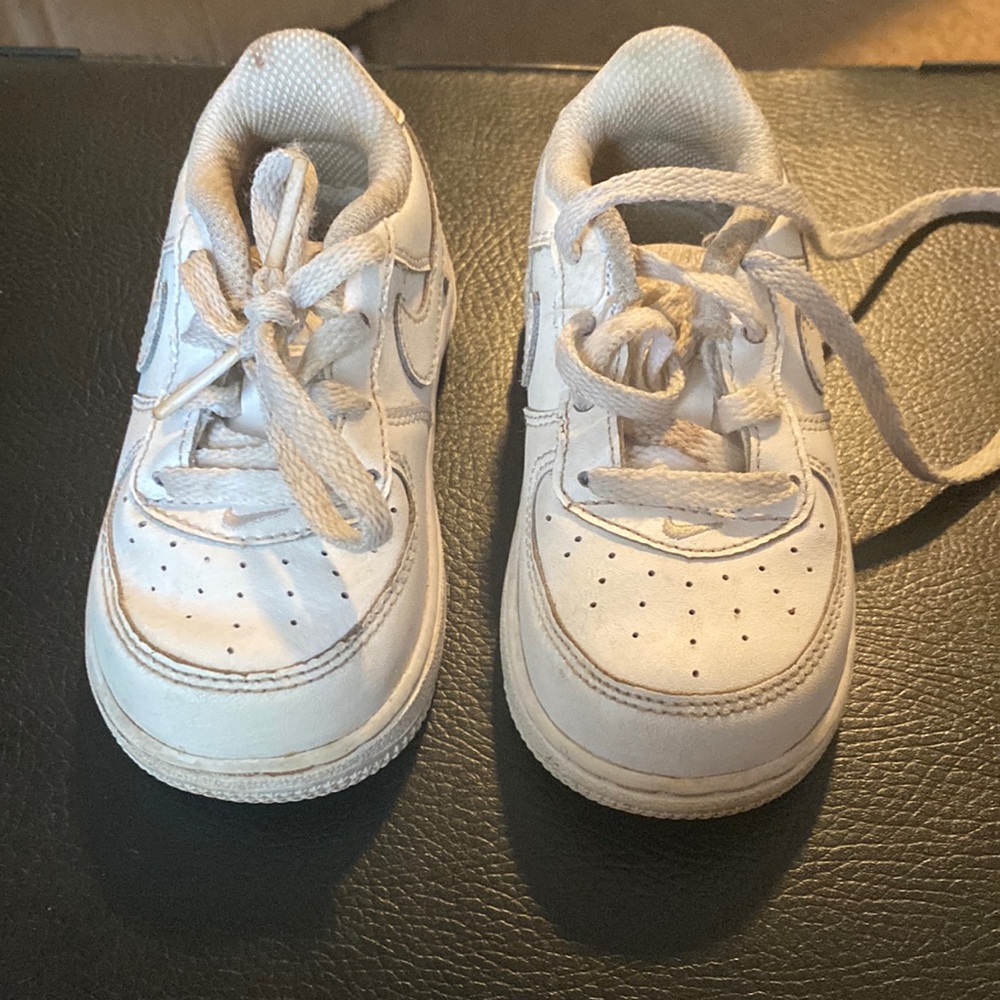 All white Nikes, size 6c